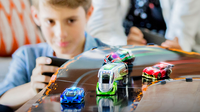 Illustration for article titled Anki's Adding Giant Racing Trucks To its Smartphone-Controlled Slot Cars